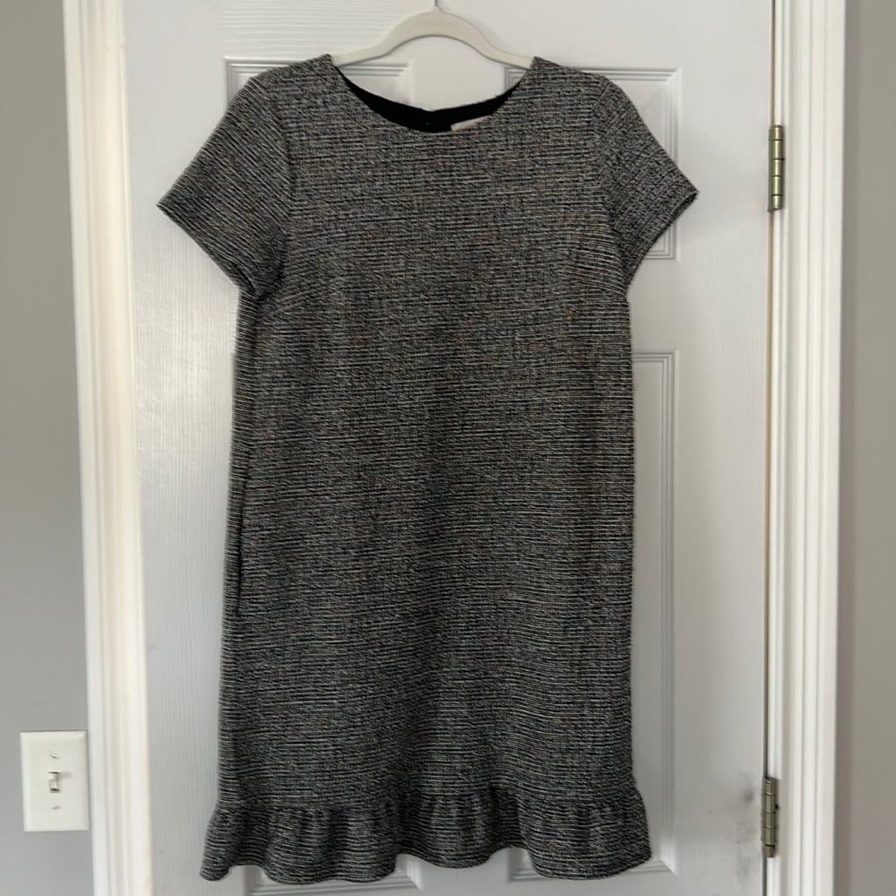 Loft black multi color dress with pockets. Zipper down the back.